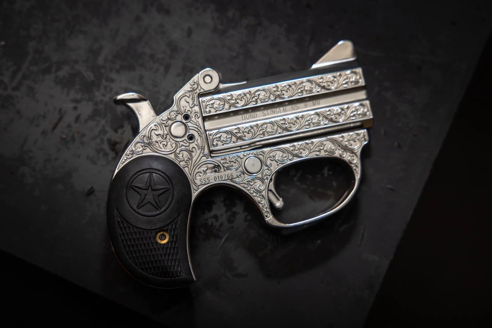 Nickel finish scrollwork — Derringer